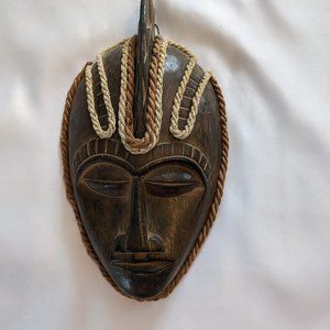 Wood and rope face sculpture